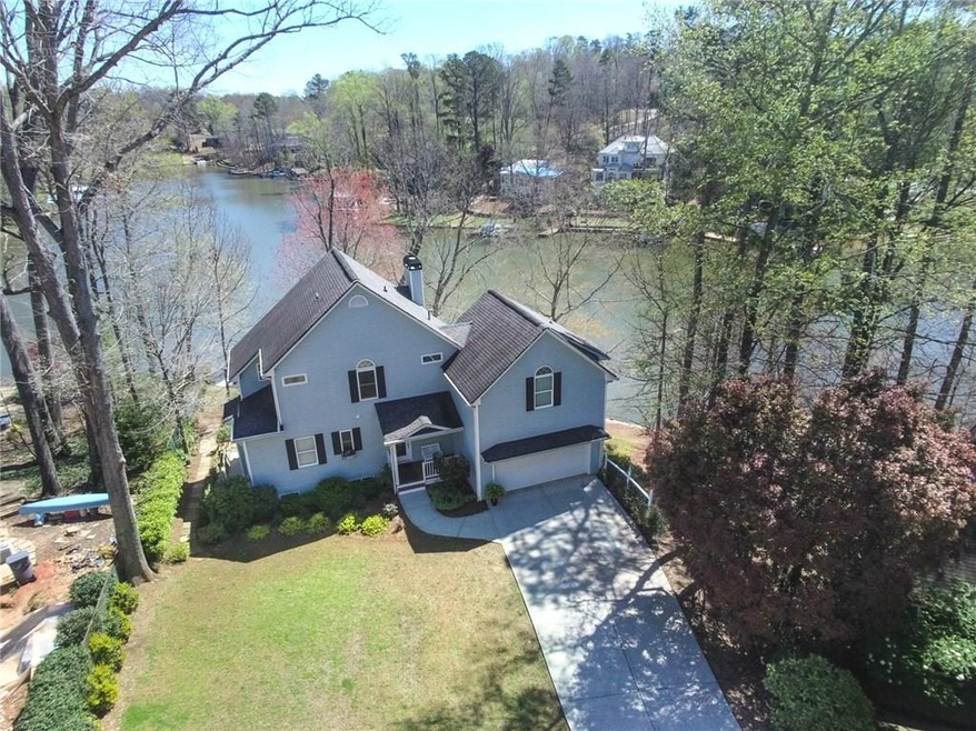 Lakefront Heaven!  This 4 bedroom, 3 1/2 bath home