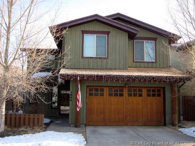 .. Wood garage door, professional landsc