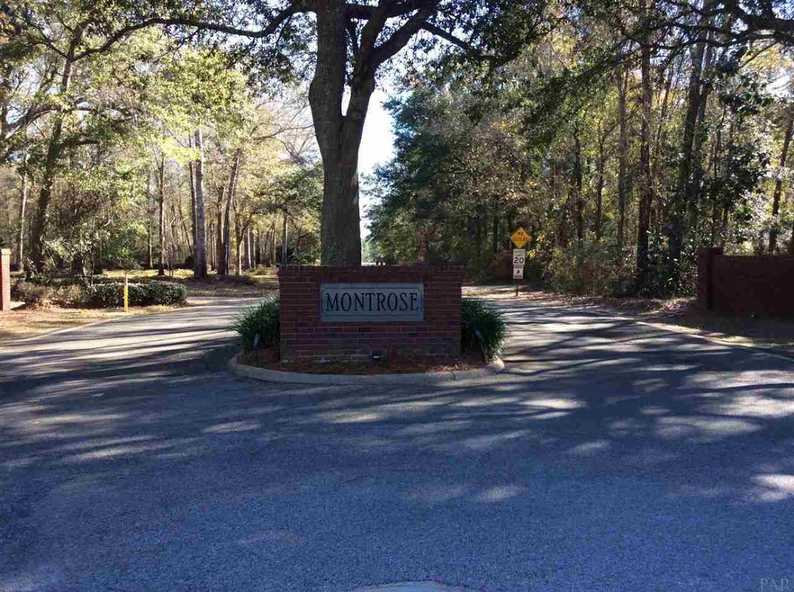 beautiful large oaks greet you.