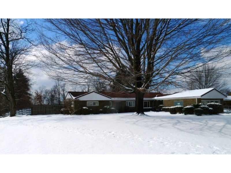 Exterior Front. Spacious ranch sits on wide corner