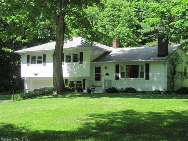 Exterior Front. House site is far back from the ro