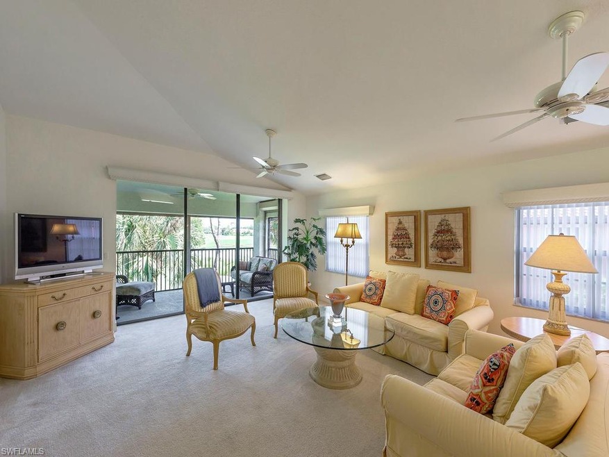 great room area overlooking golf course and lake