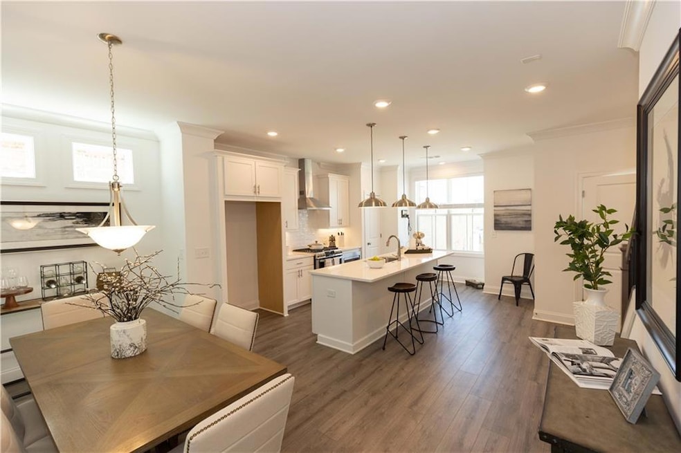 Welcome Home to Market Square at Sawnee Village!  *Photos are of stagged home. Photos shown are not actual unit.*