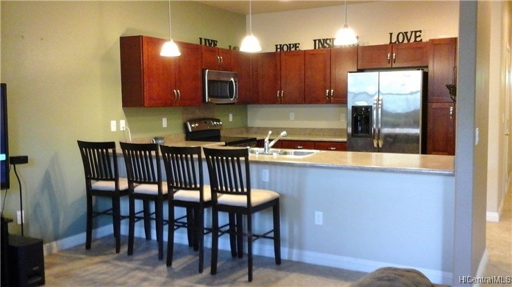 Kitchen has upgraded counters & cabinets. Stainles