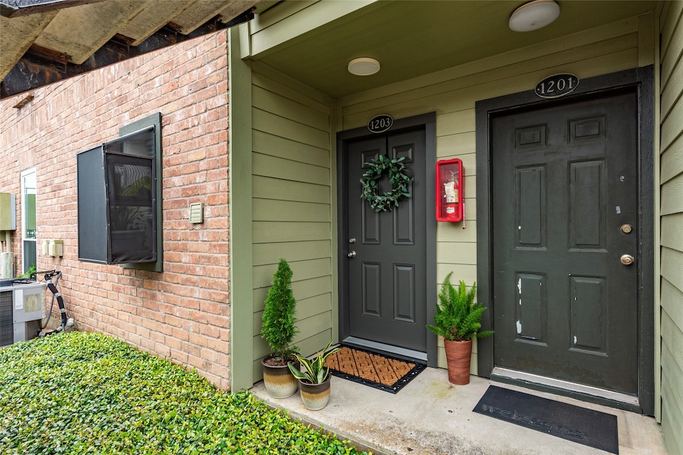 Step inside this charming home through a warm and