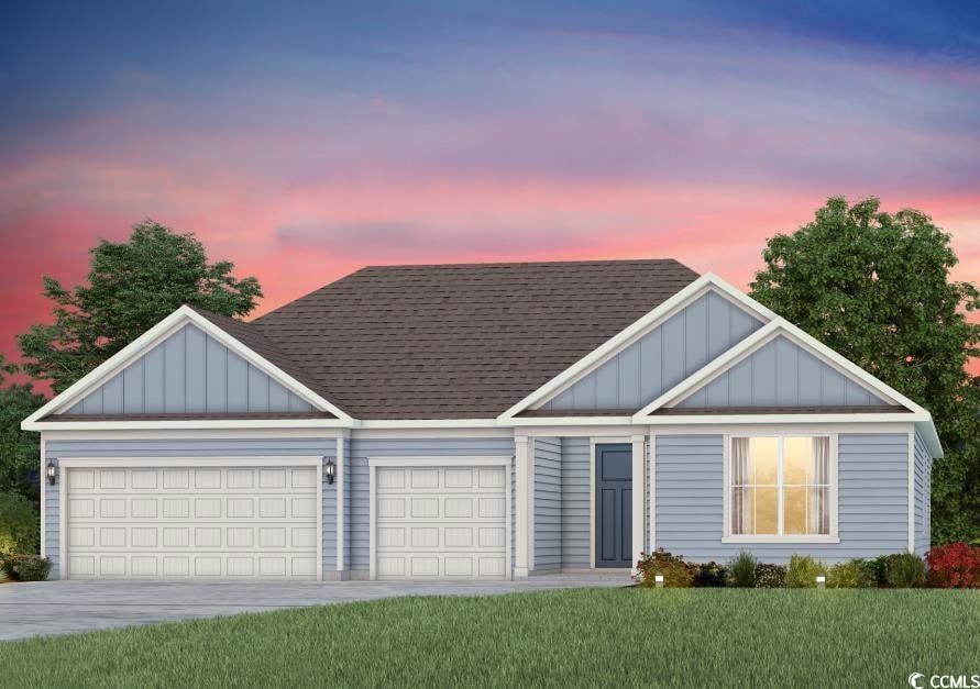 View of front of home with board and batten siding, a garage, roof with shingles, and driveway