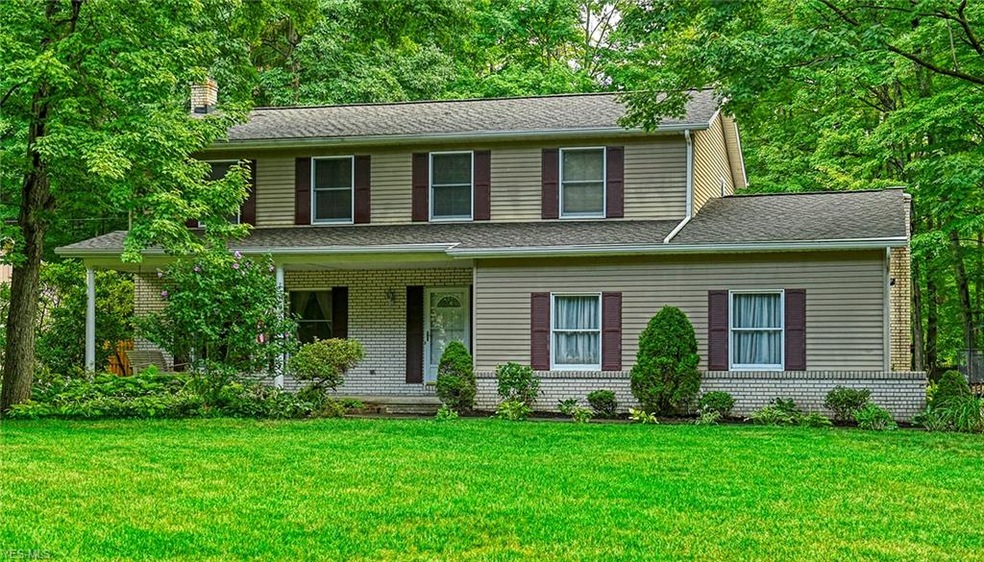 Nicely landscaped 4 bed, 2.5 bath colonial with co
