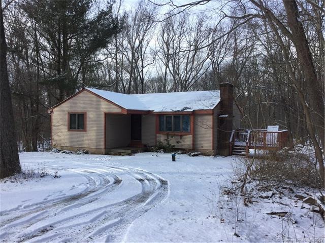 Ranch on an acre with circle drive.