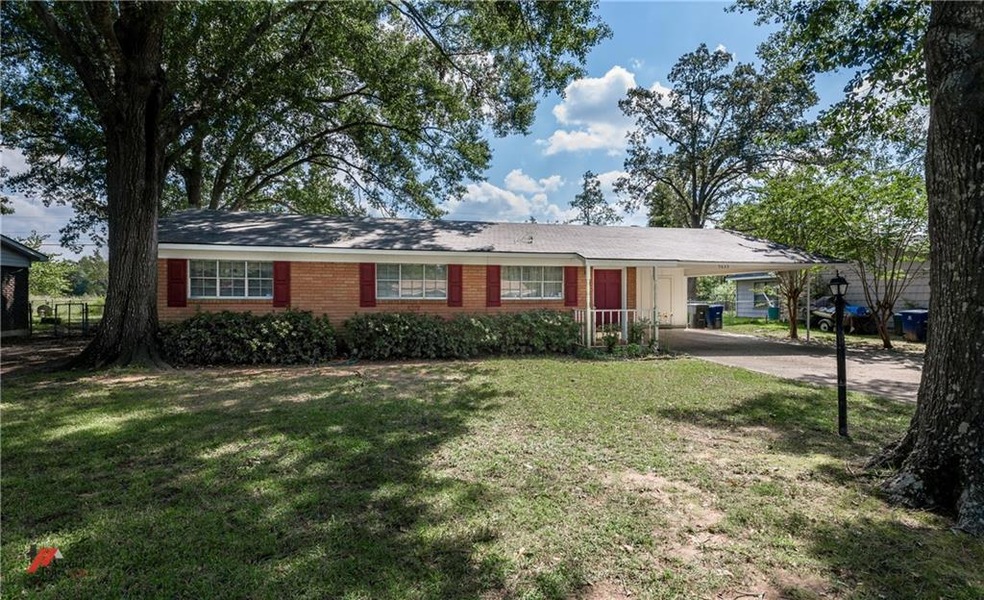 THIS 4 BEDROOM/ONE OWNER HOME SITS ON A BEAUTIFUL 