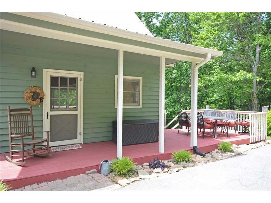 Welcoming front porch wraps around all the way to 