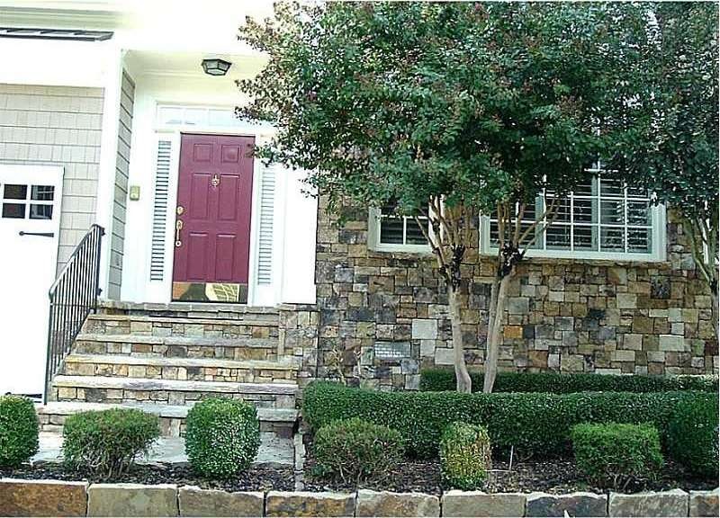 Exterior Front. Stacked Stone & Shake Home in Vini