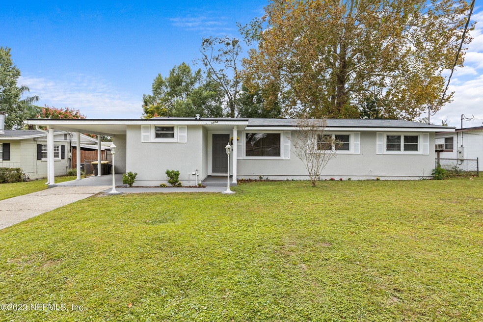 6804 Snow White Dr, Jacksonville, FL 32210 - photo 1