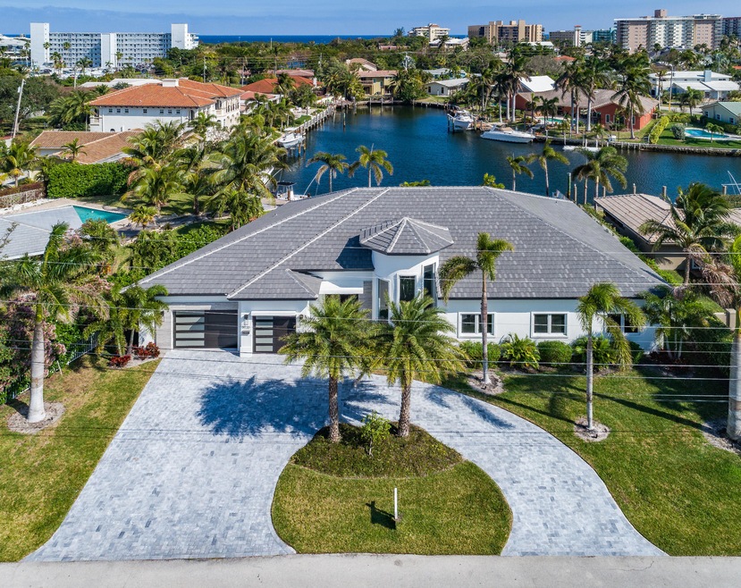 front of home and water view