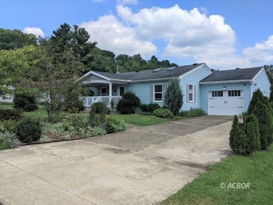 Front of house-driveway side