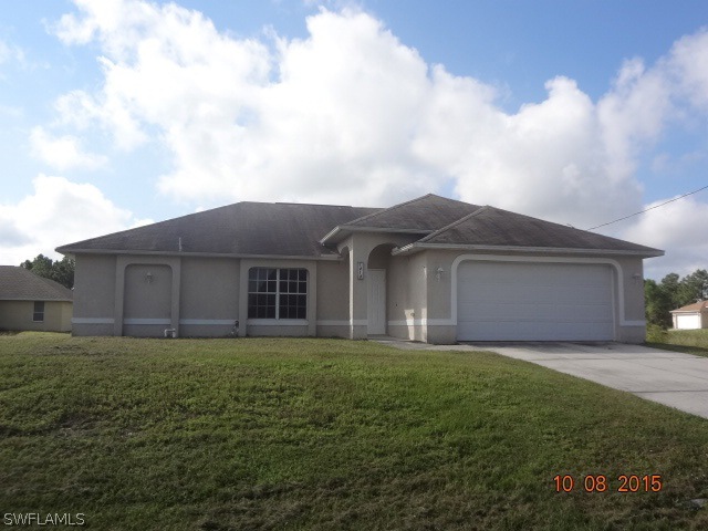 1212 Deauville St E, Lehigh Acres, FL 33974 - photo 1