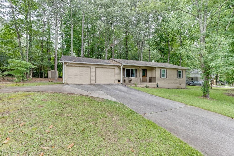 View of front of house featuring a garage and a fr
