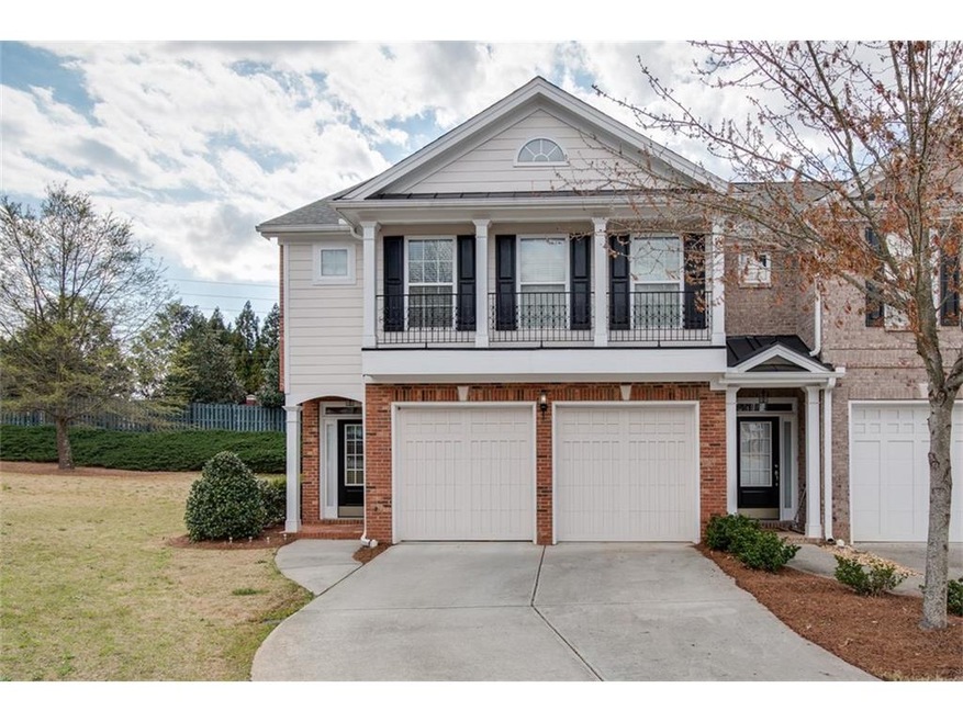 Gorgeous 3-Sided Brick End Unit Town Home with 2 C