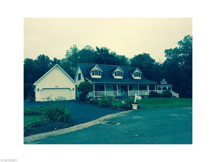 Front view of home shows spacious garage with extr
