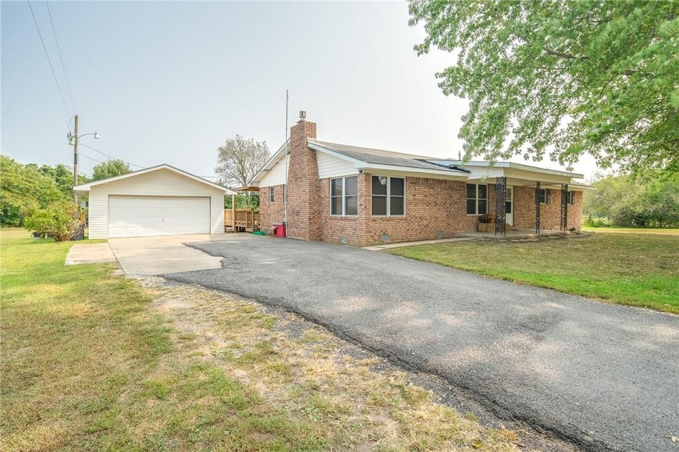 Exterior Front view charming home on one acre plus