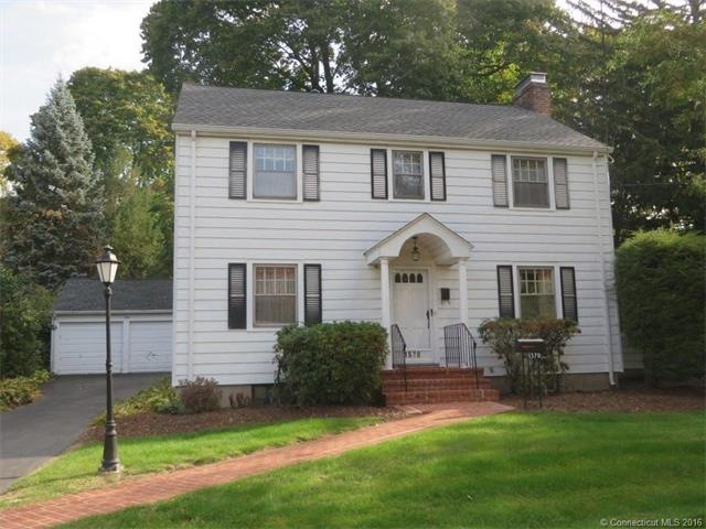 This classic Colonial in the heart of Newington bo