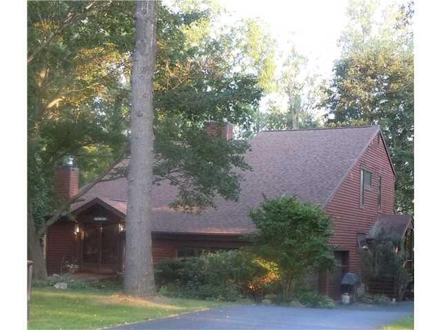 Exterior Front. Wood sided contempory with newer r