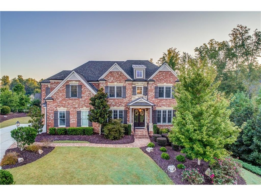 4 SIDED BRICK CUSTOM BUILT HOME WITH A 3 CAR SIDE 