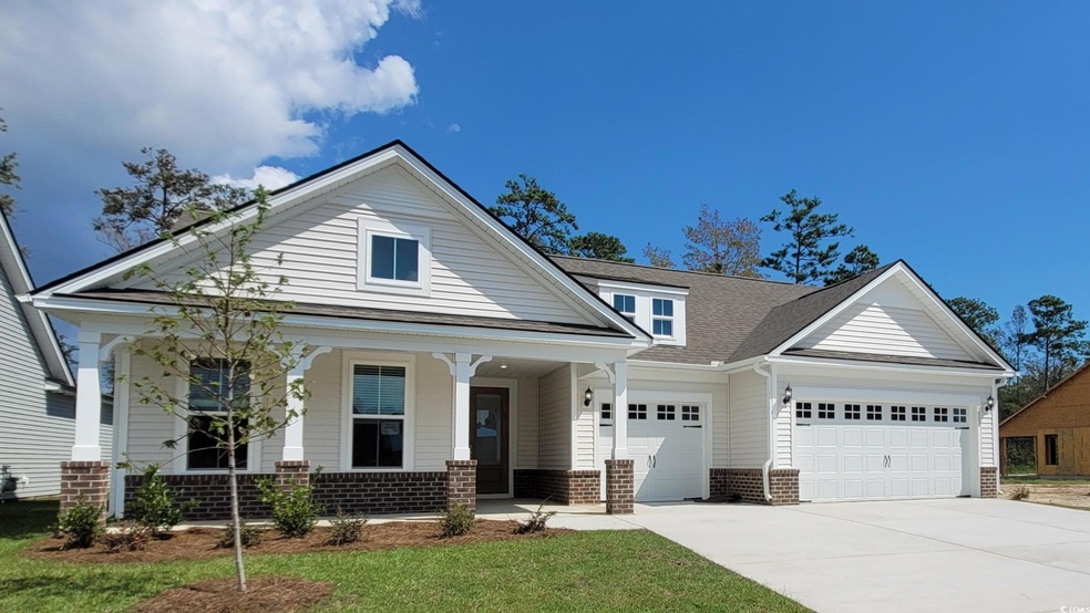 View of front of house with covered porch, a front
