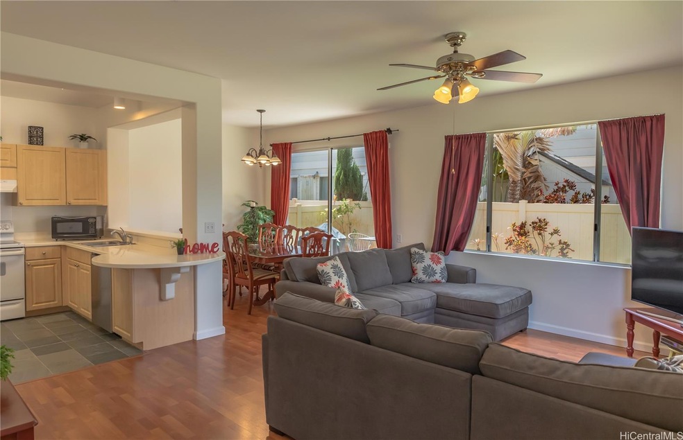 Living room dining area, and kitchen. Beautiful wo
