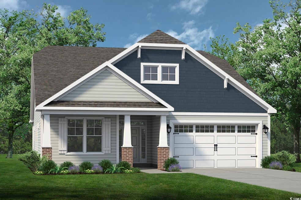 Craftsman-style house with a front lawn, a porch, driveway, and a garage
