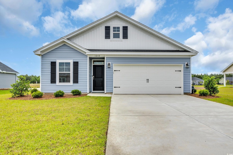 View of front of home featuring a front lawn and d