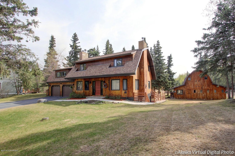 front of House with Barn