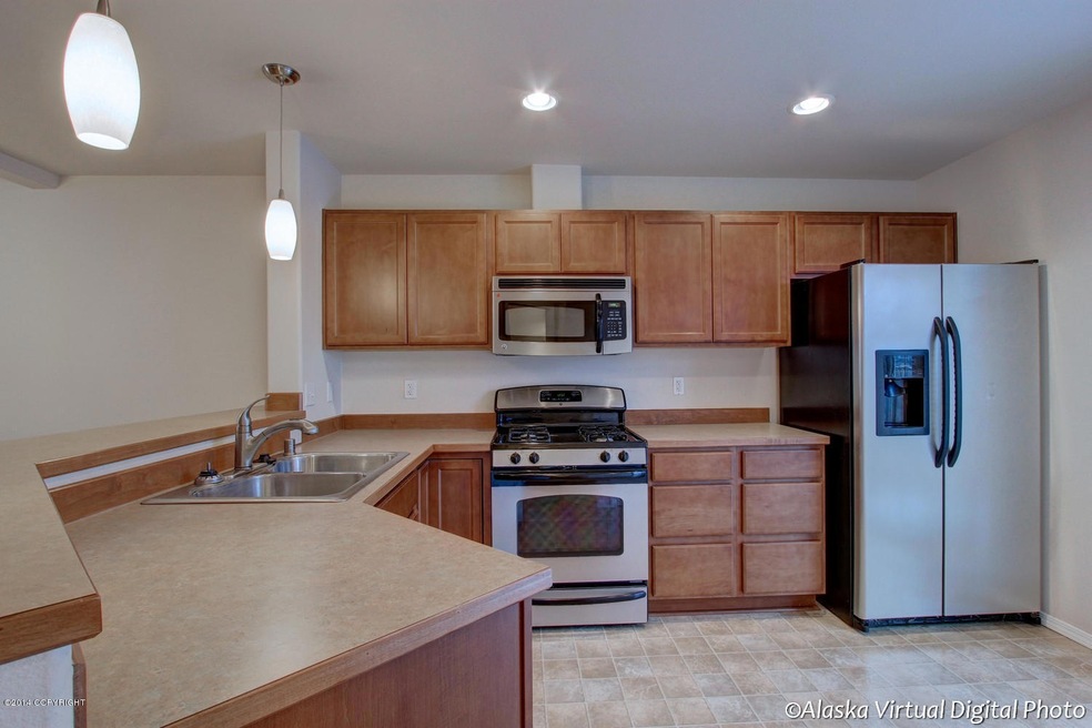 Bright, sunny kitchen with SS appliances
