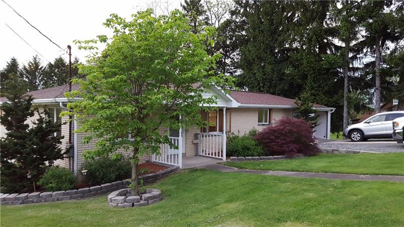Beautiful brick home with four additional parking 