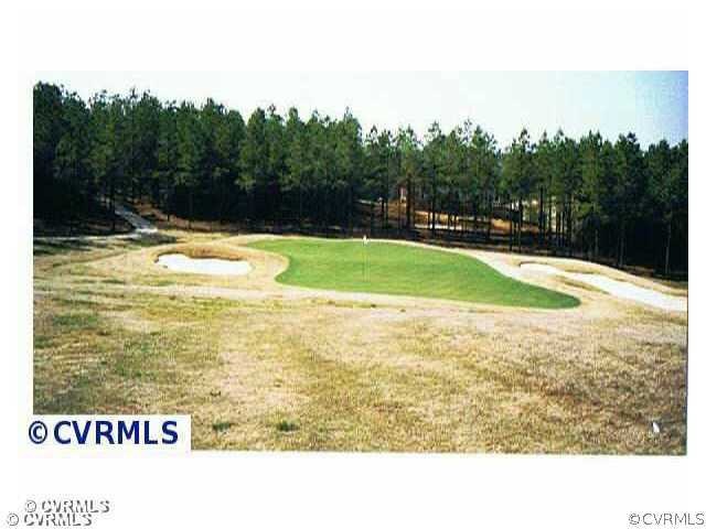 Exterior Front - Large road frontage with commanding view of hole #16 of Brickshire's signature golf course.