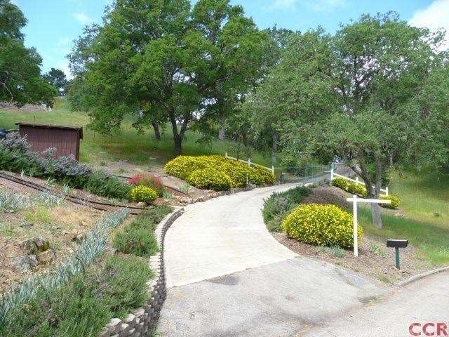 Landscaped Entrance with Private Electronic Gate