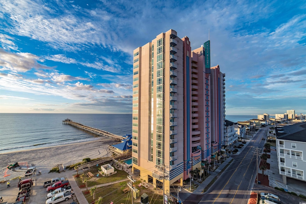 View of building exterior featuring a water view