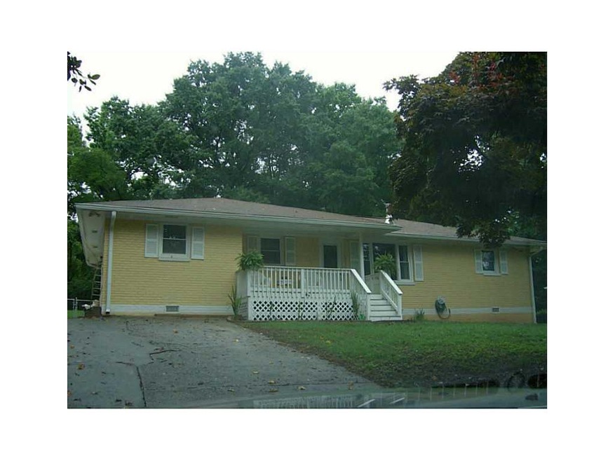 Exterior Front. Front view with large covered porc
