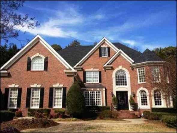 Exterior Front. Handsome cul-de-sac brick home