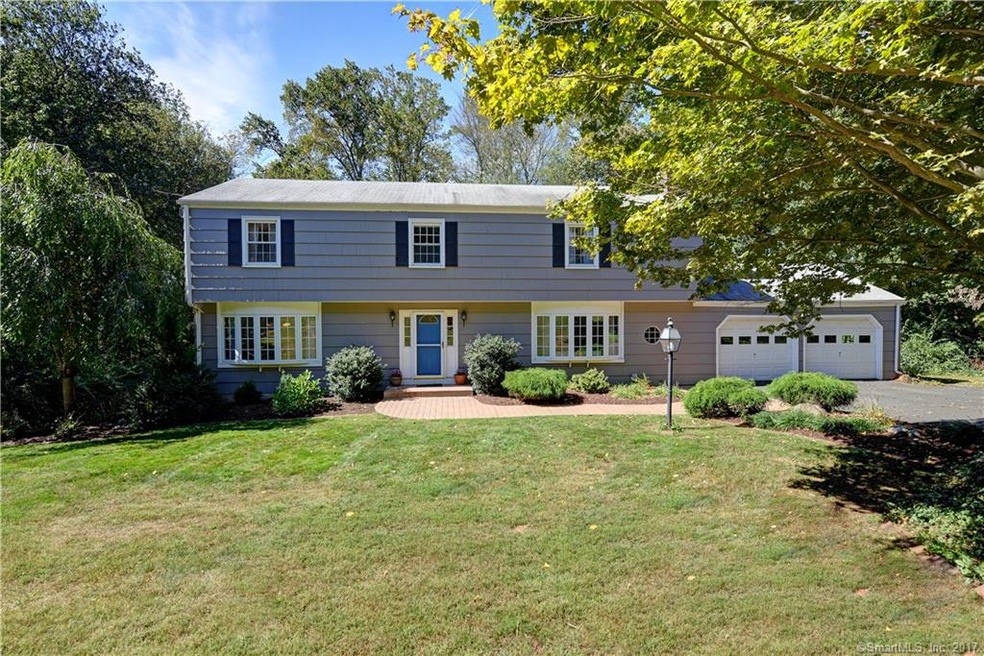 Stunning colonial on park-like setting, in desirab