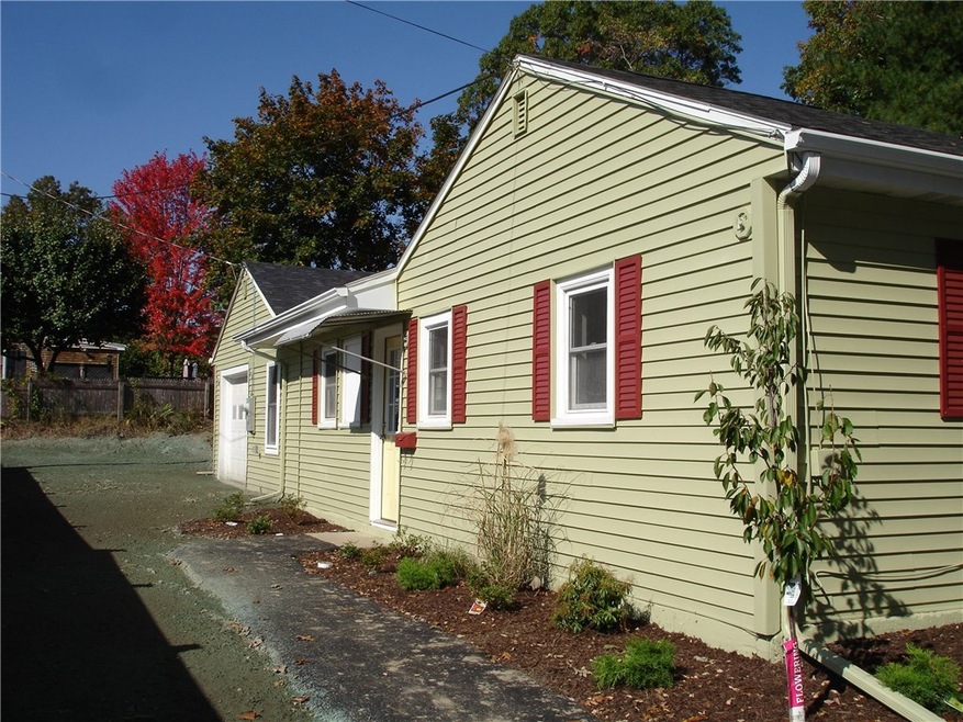 Front view of house. New roof, New vinyl replaceme