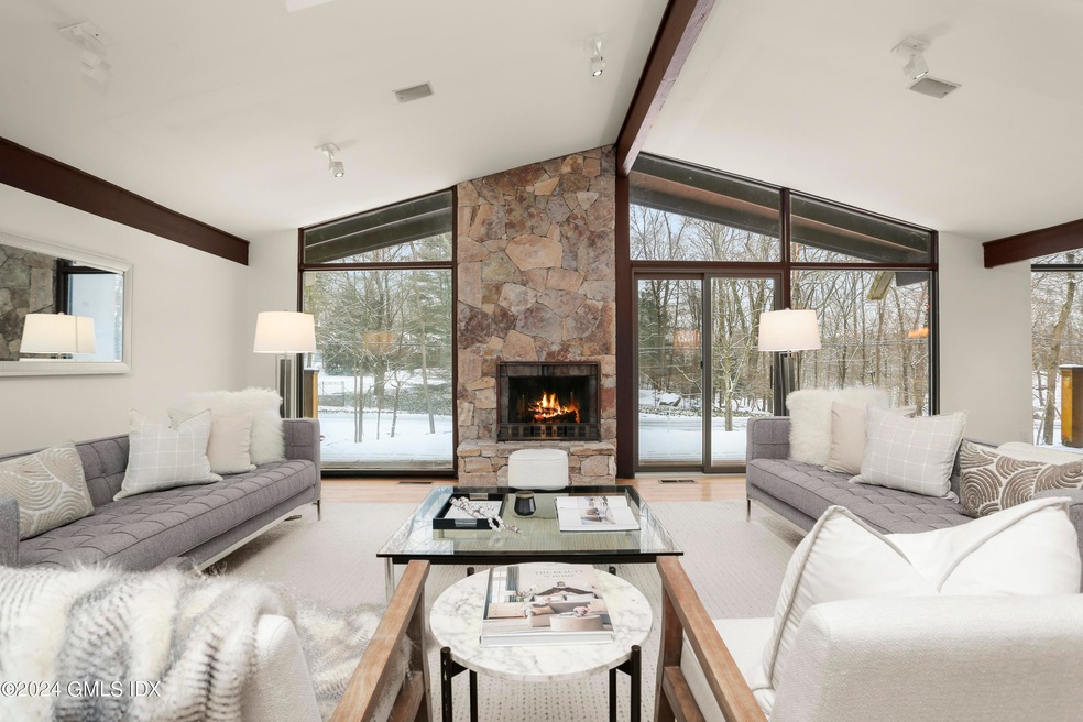 living room facing fireplace