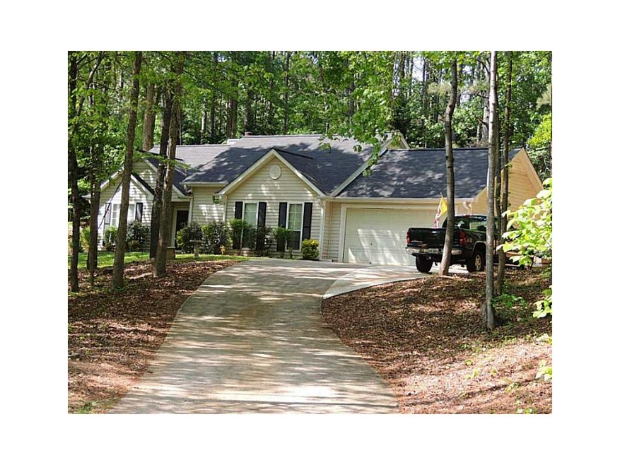 Exterior Front. Two car garage with dry wall and b