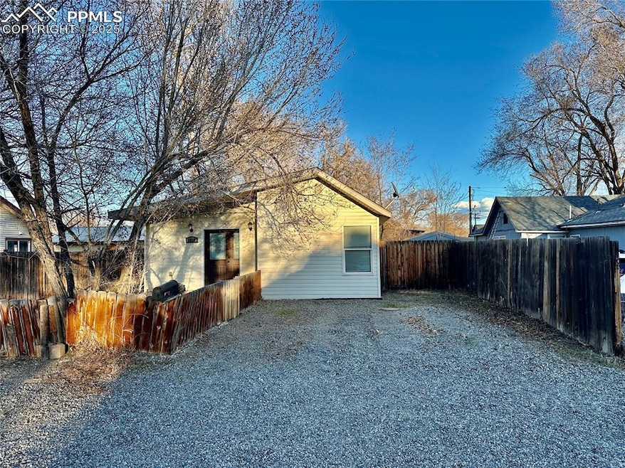 Rear view of property with fence