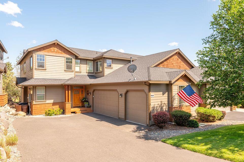 Home front with 3 car garage