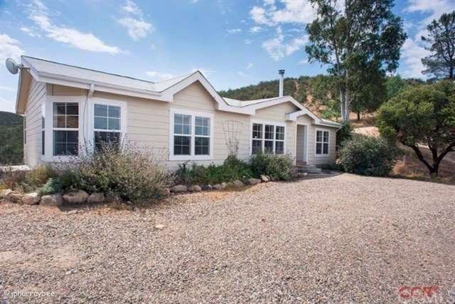 Front of house. Great views from this 3 Bedroom an