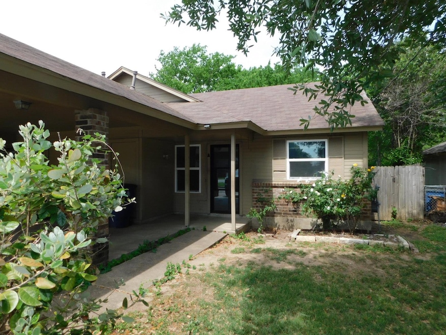 View of front of property featuring brick siding,