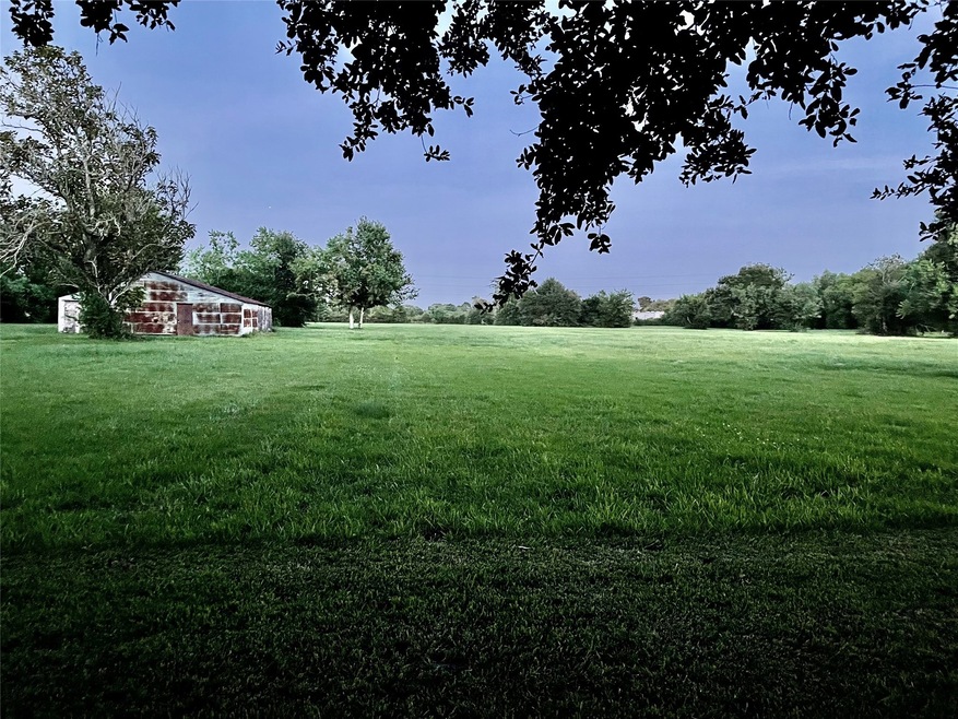 barn on left 5 acres and cleared 5 acres on right