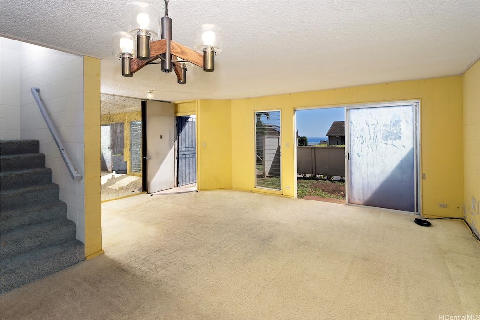 Welcome home to a large living room. Note the encl
