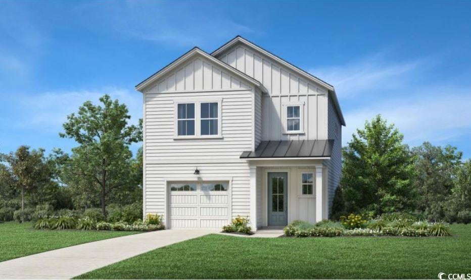 View of front of property featuring board and batten siding, a front lawn, a garage, concrete driveway, and a standing seam roof
