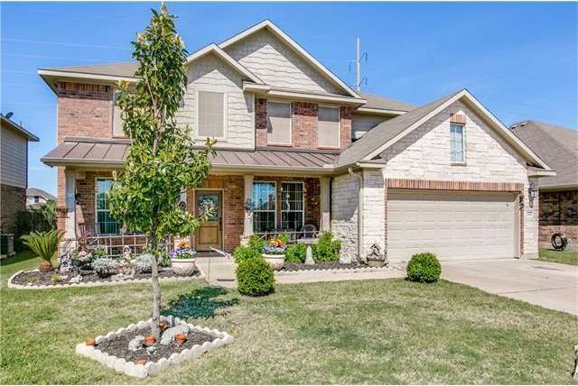 Welcoming front porch on your new home. Stone and 